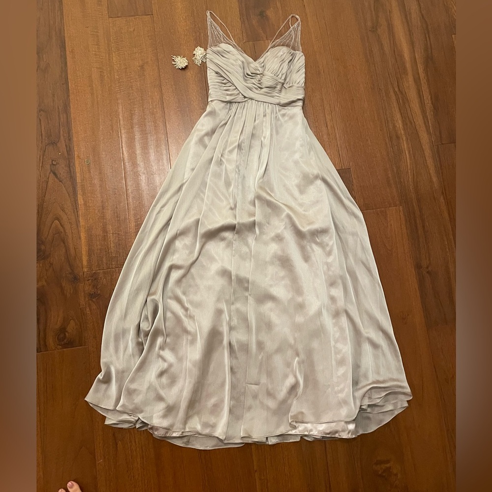 Brand new formal dress- with beautiful beadwork straps - never worn